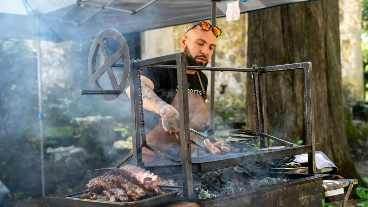 BBQ pitmaster at the smoker